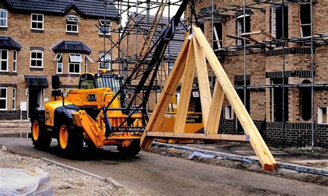 mini excavators to place roof trusses|truss boom for forklift.